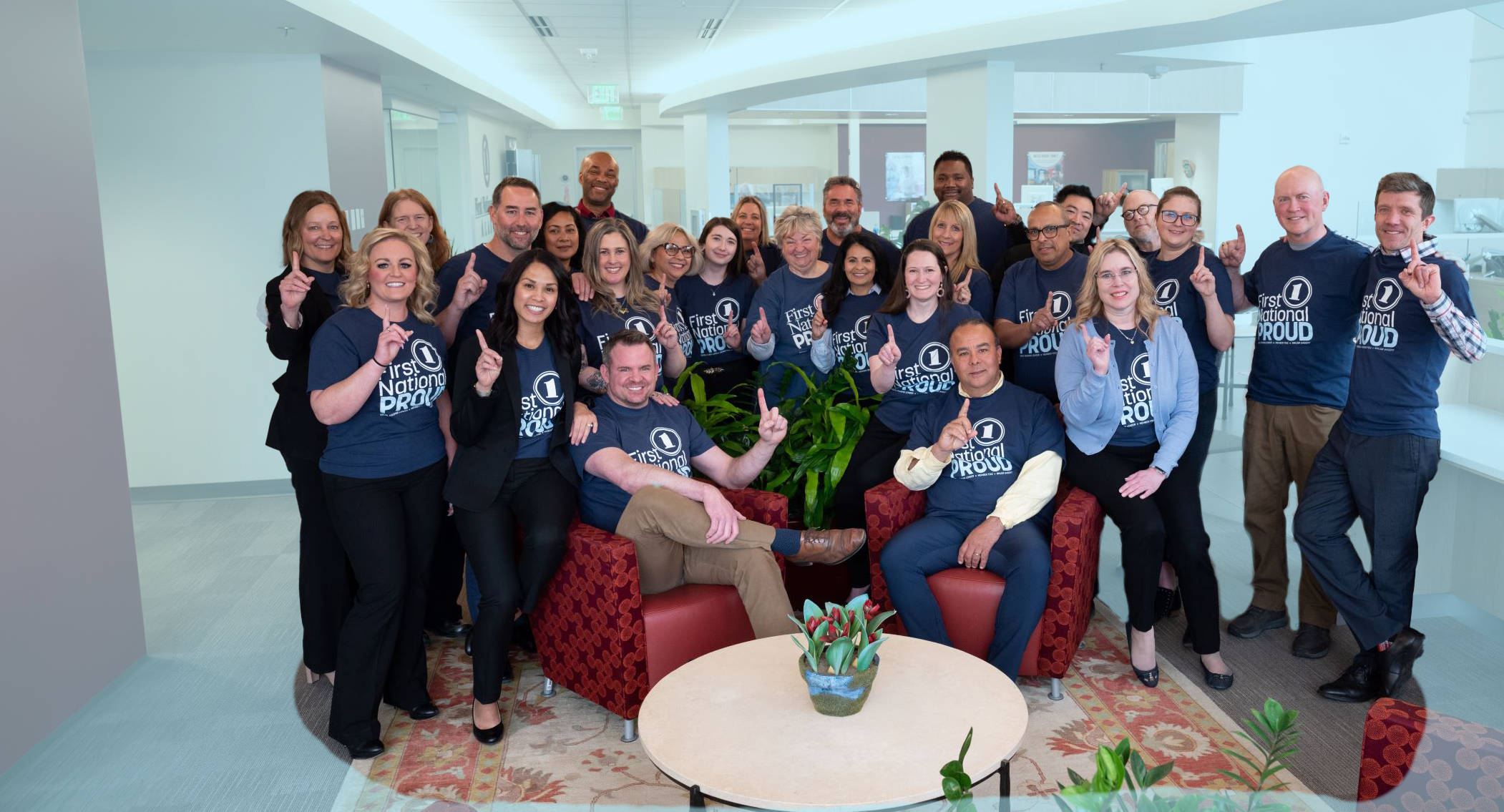 Photo of First National Bank Alaska staff celebrating Best Place to Work award.