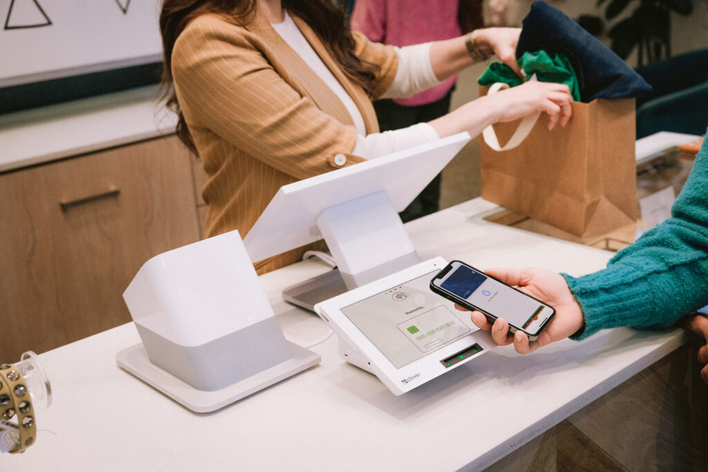 A business operating with the Clover payment system, featuring a sleek point-of-sale device for easy transactions.