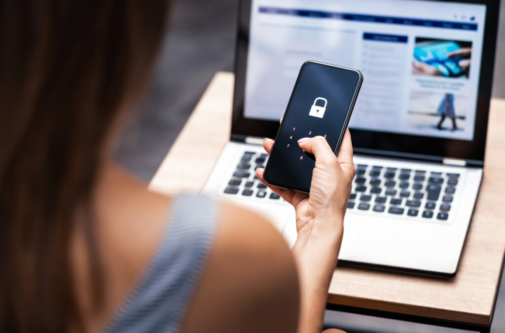 A woman using her smartphone to navigate a website, showcasing modern technology in daily life.